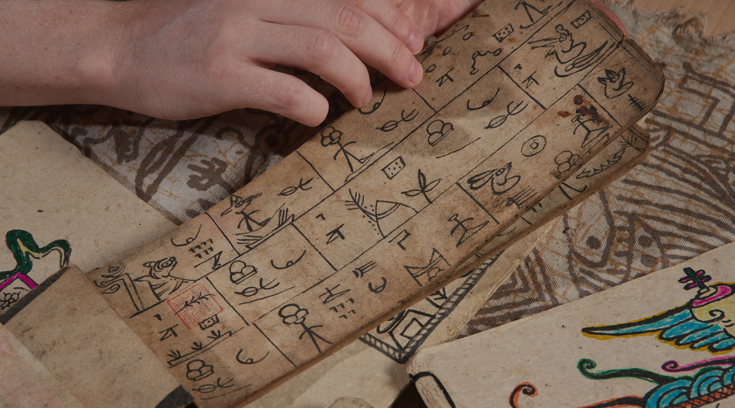 An early 20th century manuscript of the text for the <em>Herkeel</em> ceremony, the Naxi ritual to guide those having committed love suicide to the afterlife, written in the Dongba script