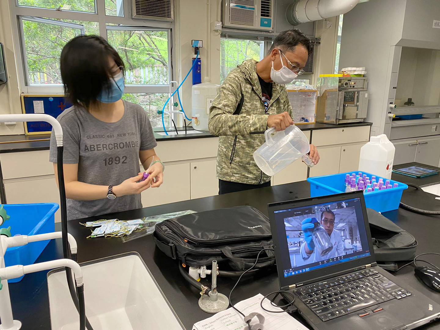 Lecturers from the Chemistry Department giving Zoom class to 16 high schools and their students on the making of alcohol handrub